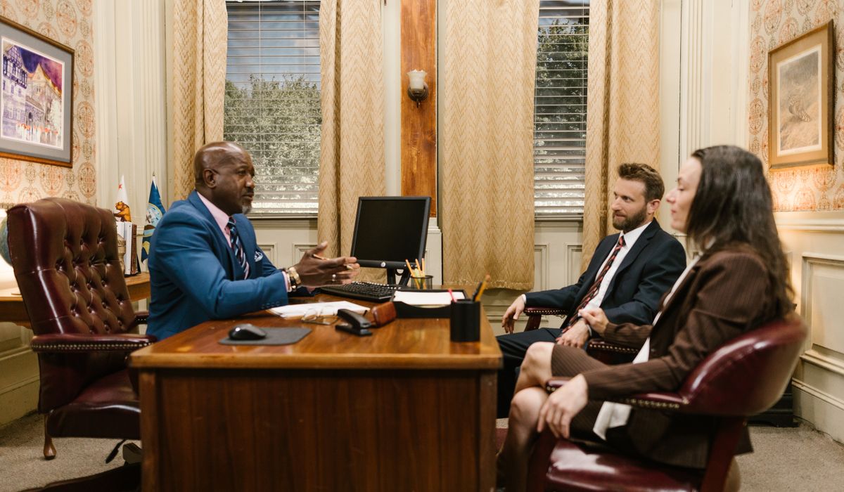Couple consulting a partner visa lawyer